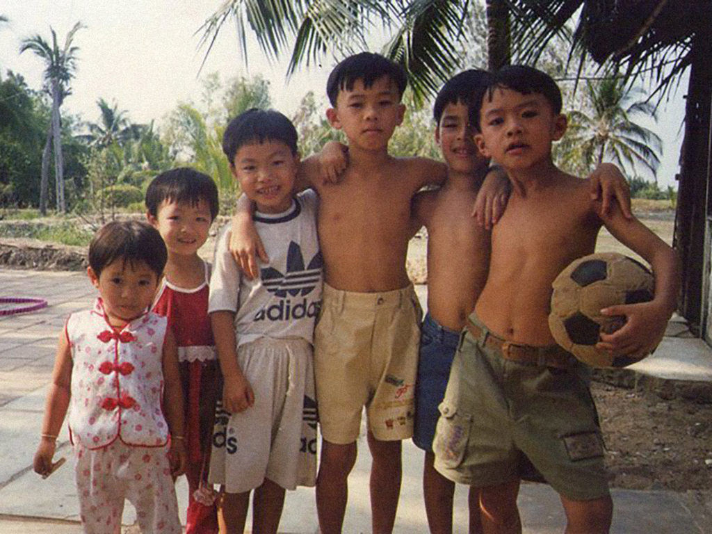 Nam with his cousins in the village of NhaBe