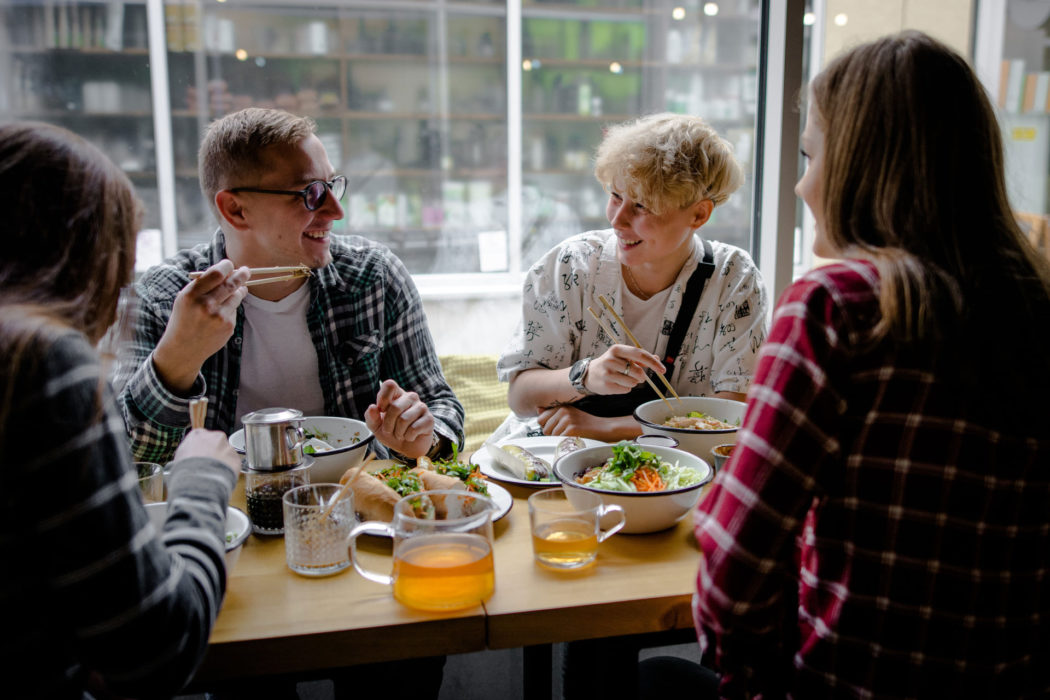 Customers at the NhaBe bistro